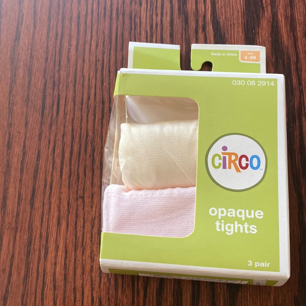 Two pair, beige and pink tights